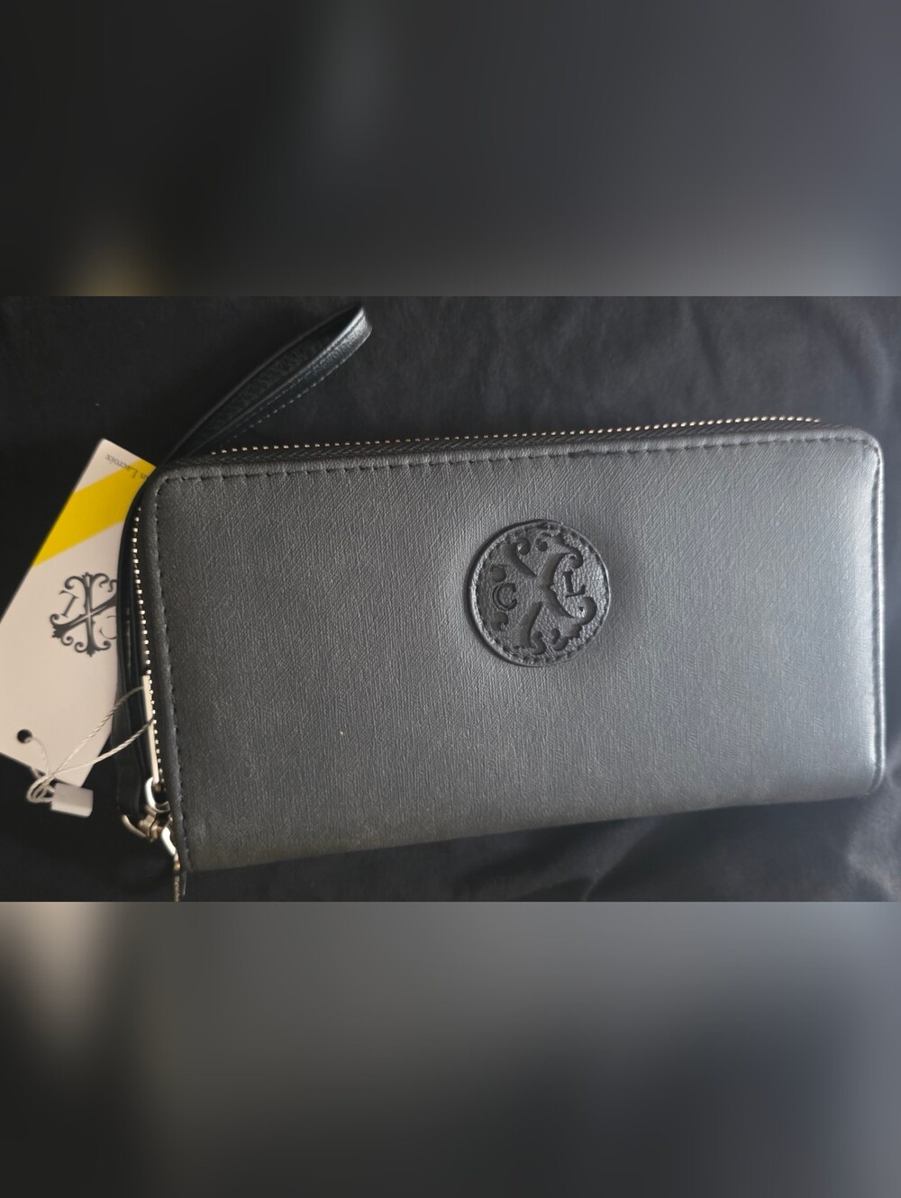 Christian Lacroix Black Zip-Around Wristlet Wallet with Embossed Round Emblem